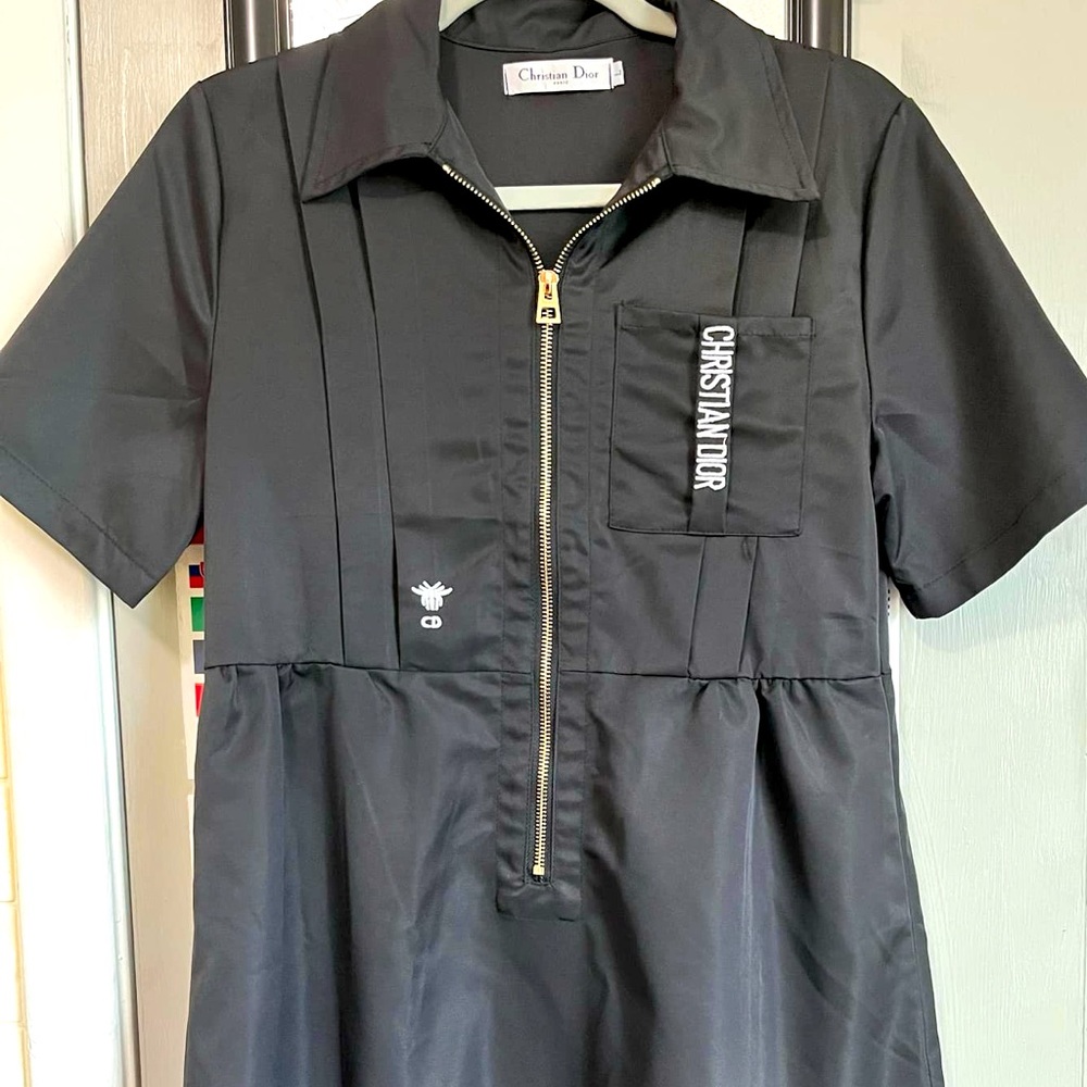 Black short dress. CD inspired
